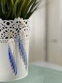 Asymmetrical blue and gold beaded fringed earrings 