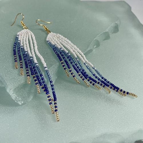 Asymmetrical blue and gold beaded fringed earrings 